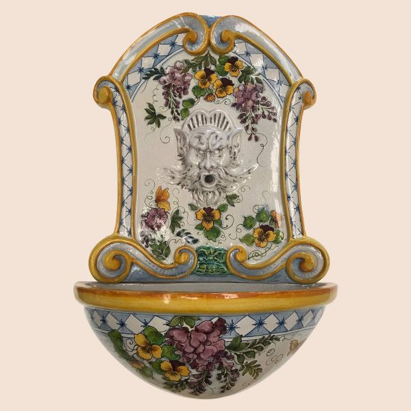 WALL FOUNTAIN WITH HEAD AND FLOWERS